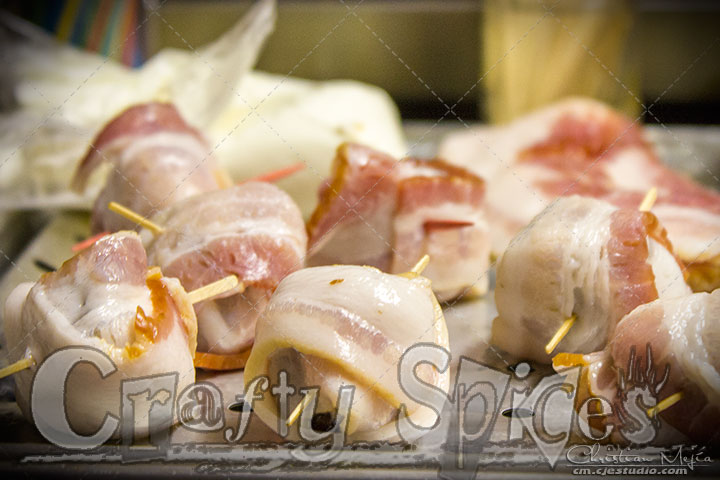 Cream Cheese Stuffed Prunes Wrapped in Bacon before putting into the oven Cream Cheese Stuffed Prunes Wrapped in Bacon before putting into the oven