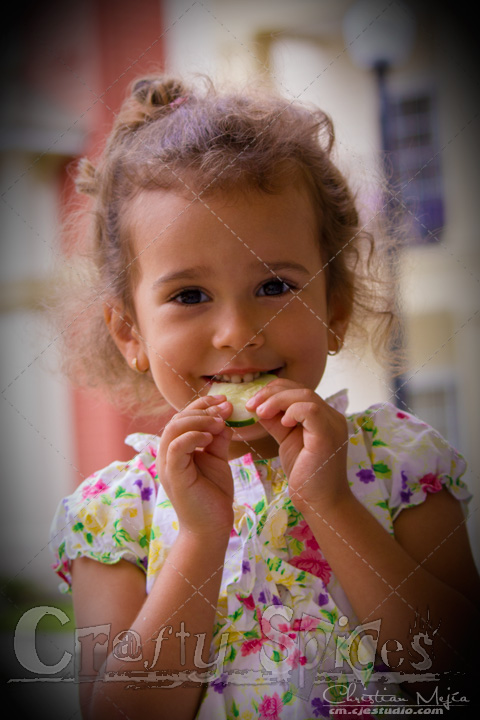 Kira enjoying some cucumbers.