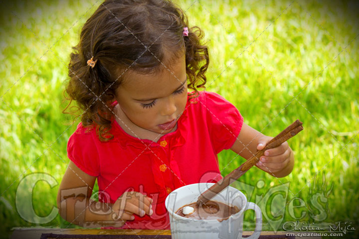 Kira enjoying her hot cocoa