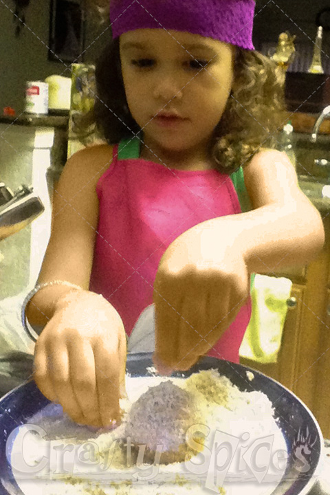 Kira helping us make Sweet Potatoes Rice Krispies bites