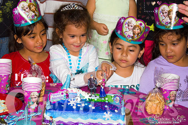 Kira very excited cutting the Cake