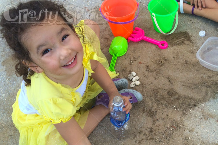 A Beach Day, without the Beach… Kaylee playing with sand