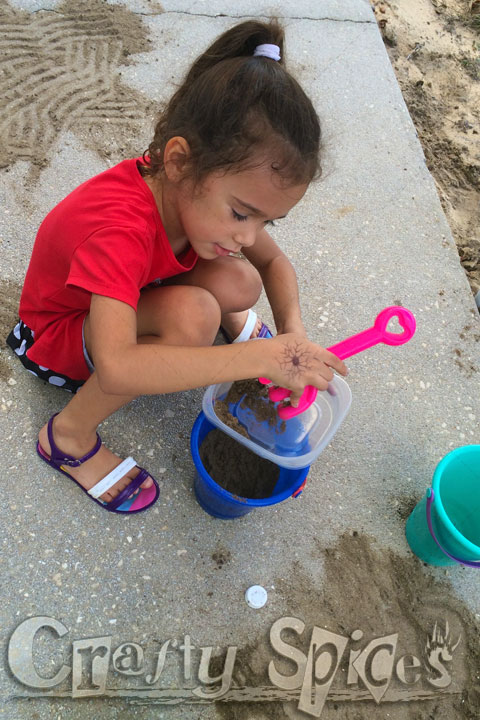 A Beach Day, without the Beach… Kira playing with Sand