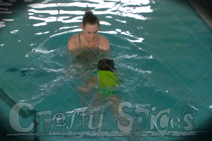Kira Swimming to her Trainer