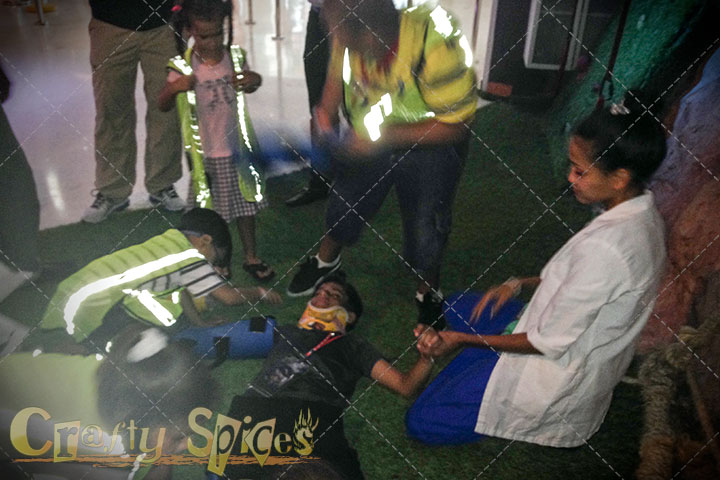 Children helping an injured person (make believe) Children helping an injured person (make believe)