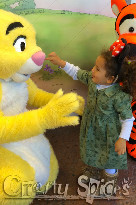 Kaylee with Pooh and friends