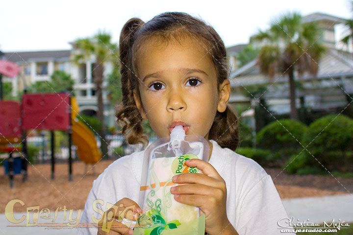 Kira enjoying a healthy treat in a Pouch2Go Kira enjoying a healthy treat in a Pouch2Go