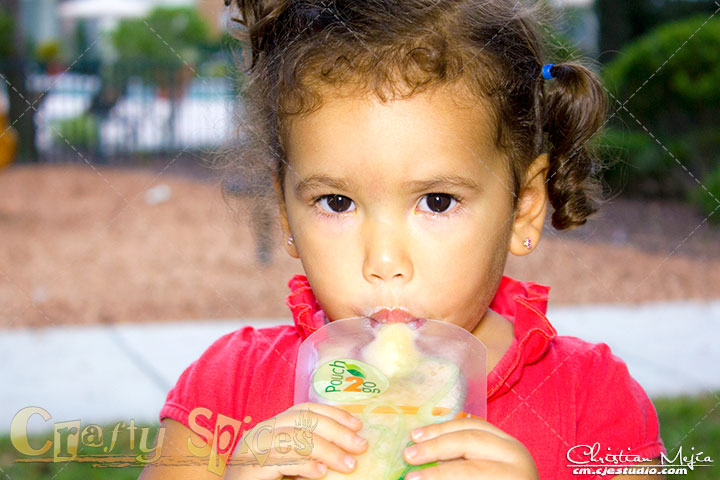 Kaylee enjoying a healthy treat in a Pouch2Go Kaylee enjoying a healthy treat in a Pouch2Go