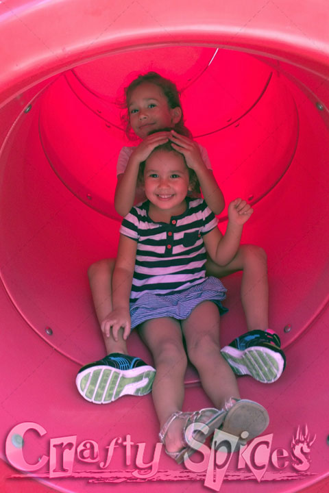 Our two little girls having fun at the Playground Our two little girls having fun at the Playground