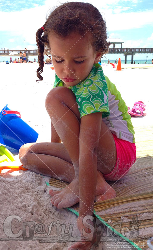 Kira playing with the sand