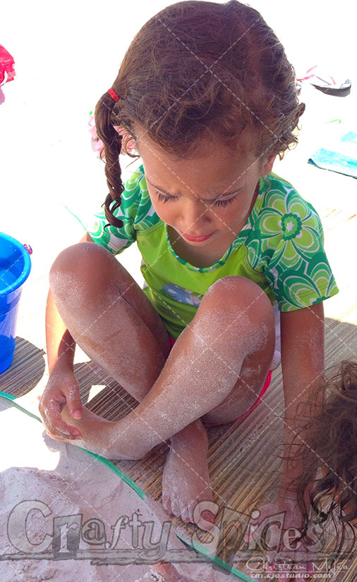 Kira playing with the sand Kira playing with the sand