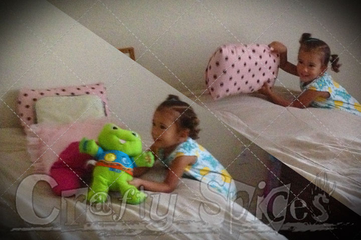 She put the bed cover, the cushions and her froggy to finish it off