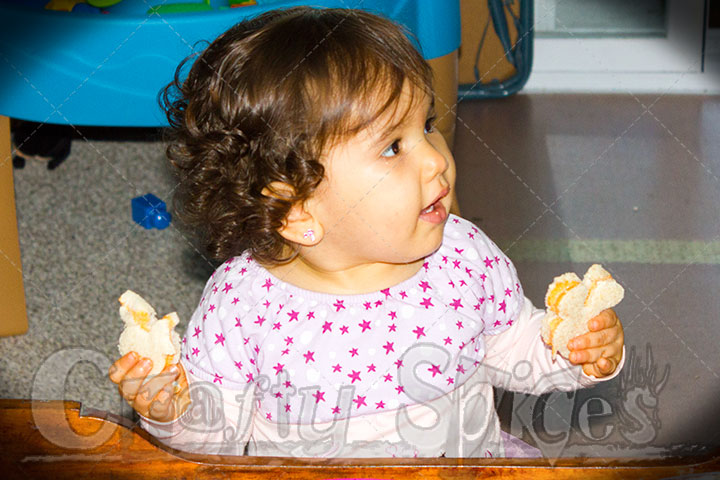 Kaylee eating Mickey Mouse Sandwiches