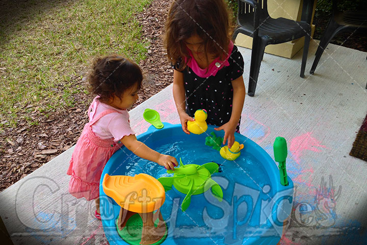 The Girls playing with the Step2 Duck Pond Water Table